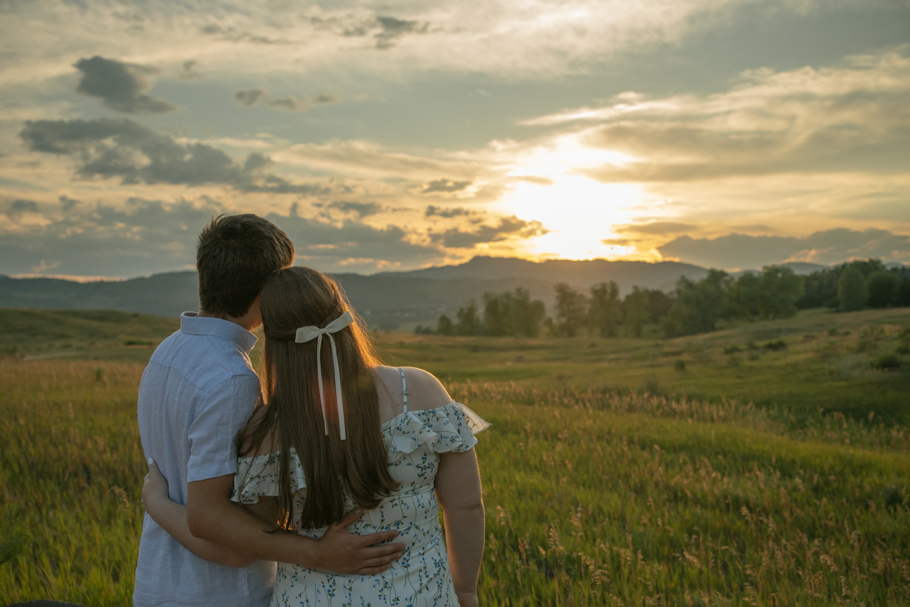 Portrait of Joe and Danielle, sunset background